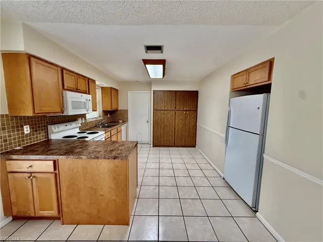 706 E 3rd St, Lehigh Acres, Florida 33936