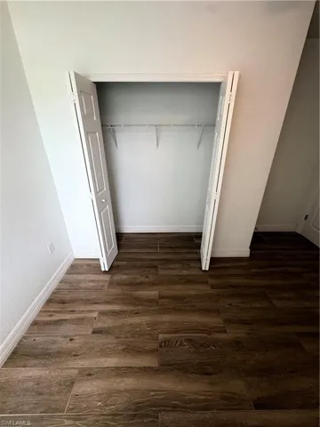 Wood-finish tile flooring throughout