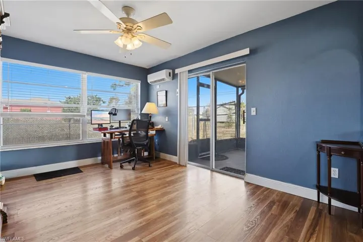 The den in light and bright with great windows and a mini split for extra cooling.