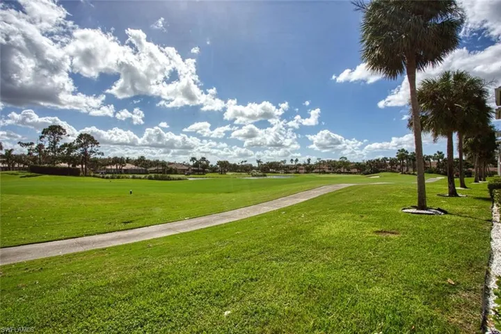 View of community featuring a yard