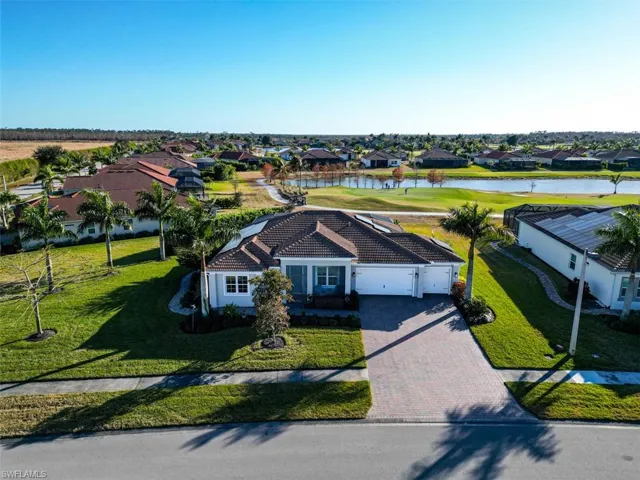 Aerial view of residential area with a nearby body of water