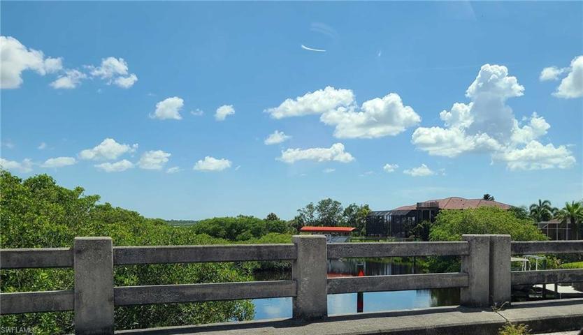View of nearby Waterfront homes & canals from Eisenhower Dr