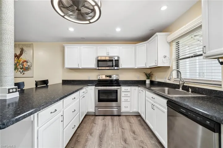 All stainless appliances and lots of cabinets