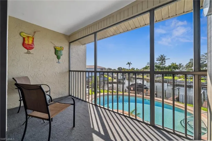 Master /Primary Bedroom Balcony. Enjoy your morning coffee as you watch the manatees and dolphins swim by.