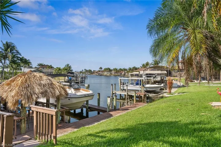 Watch the dolphins from the tiki hut