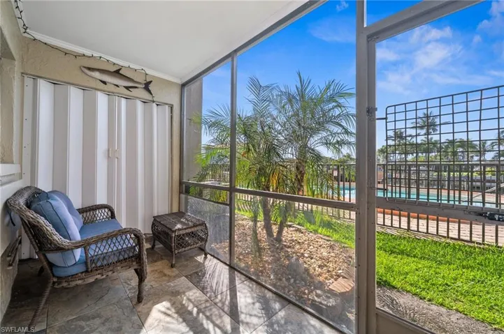 Downstairs screened -in Porch. Just feet from the pool and your boat dock!