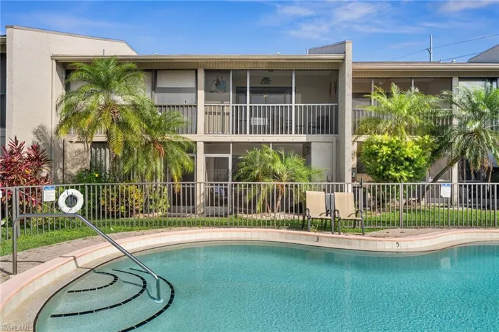 Large community pool and lounge area.