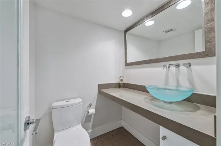 Half Bathroom featuring tile patterned floors