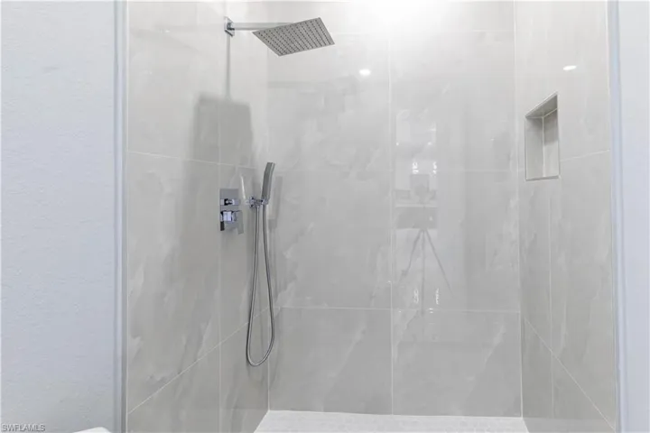 Bathroom with tiled shower