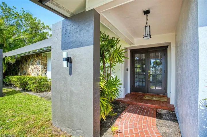 Doorway to property with french doors