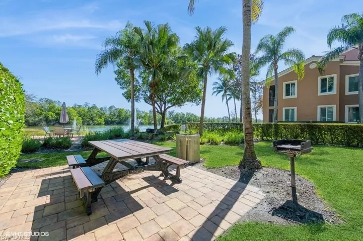 Grill area with lake view by pool