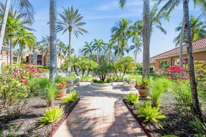 View of community featuring a patio by the pool