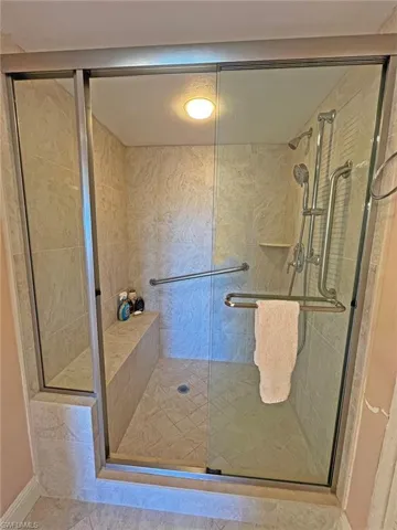 Bathroom featuring a shower stall