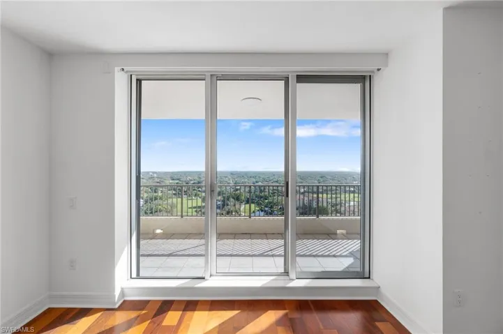 Doorway featuring hardwood / wood-style floors