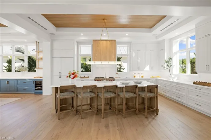 Beautiful pool with water feature and hot tub.