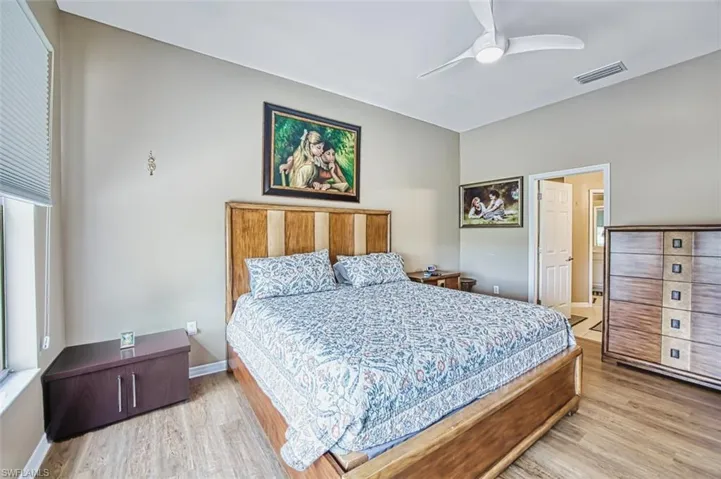 Bedroom featuring ceiling fan and light wood-style floors
