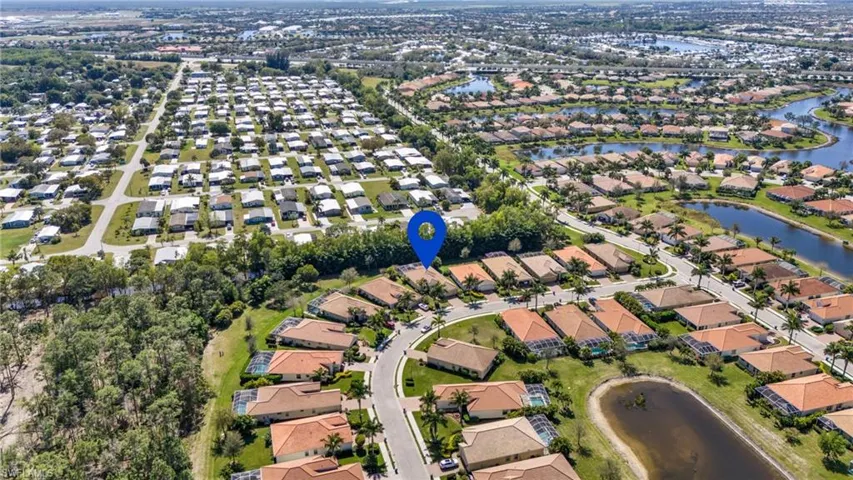 Bird's eye view featuring a water view and a residential view