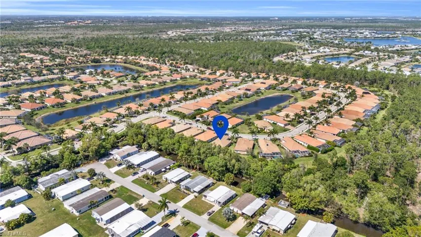 Bird's eye view with a water view and a residential view