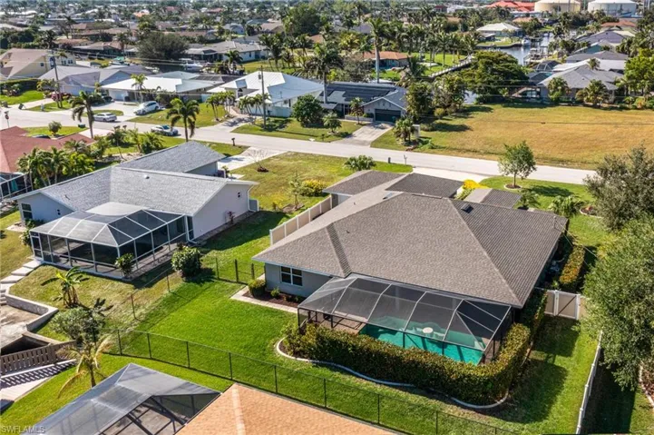 Aerial view of the Back of this Spacious Triple Lot