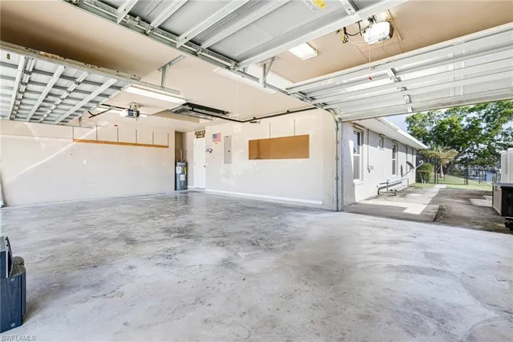 THREE Car Garage with pass through Back Door Opening to store Boat, Trailer, Extra Toys....