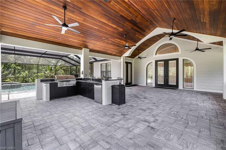 Outdoor Kitchen and Expensive Pool deck and lanai