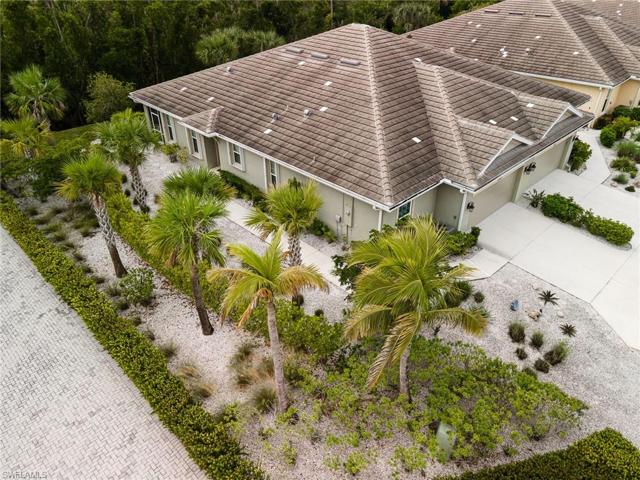 Beautiful end villa with expansive side yard and views of the peserve in the back.
