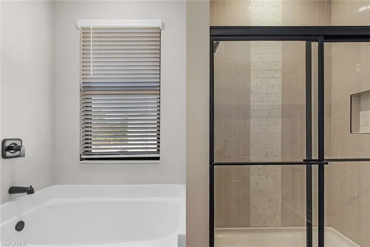 Foyer entrance with wood tiled floors and recessed lighting