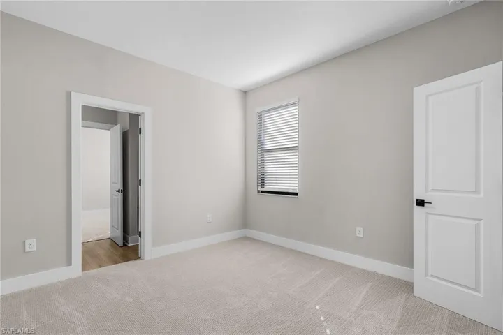 Empty room with wood finish floors and baseboards