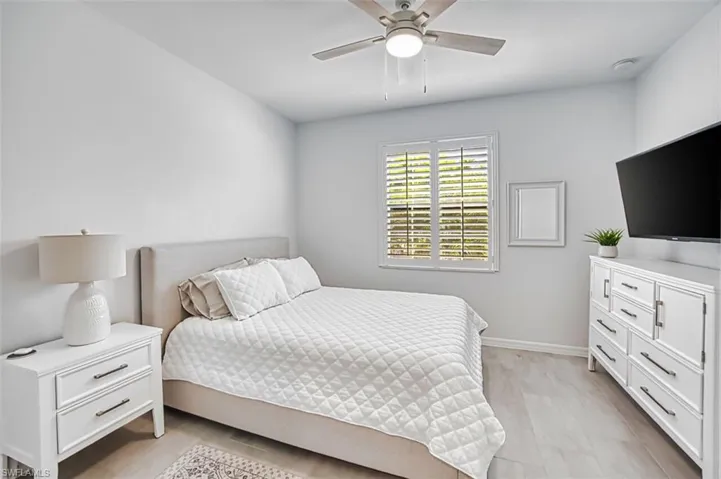 Bedroom #2 featuring ceiling fan and light wood finished floors
