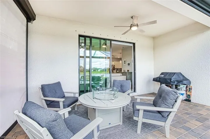 Lanai featuring ceiling fan and grilling area