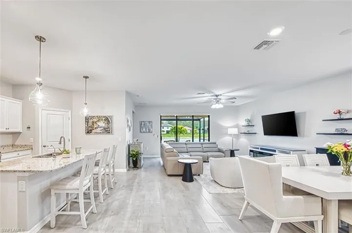 Open concept living, dining, kitchen