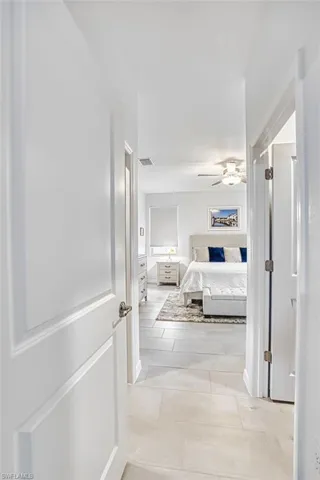 Entry to primary bedroom with 2 walk in closets