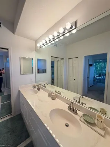 Full bathroom featuring double vanity