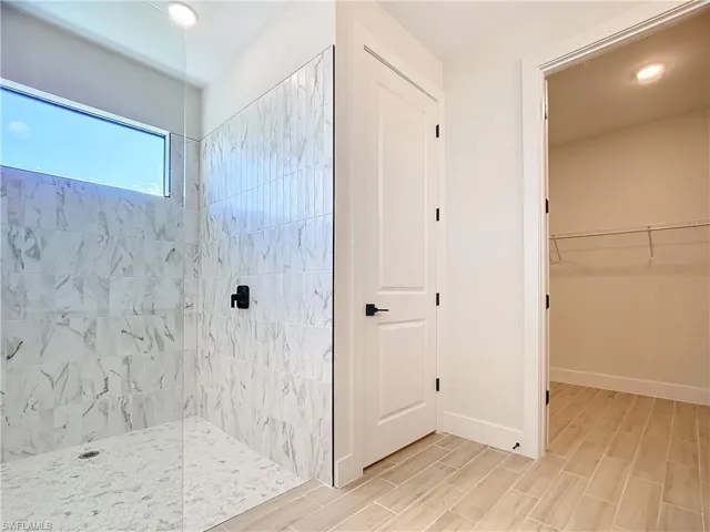 Bathroom with tiled shower
