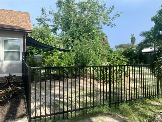 Fenced area on the southside of house.