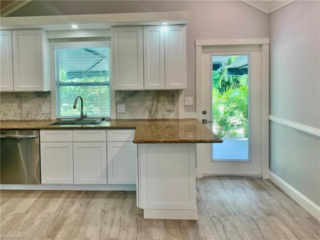 Kitchen closeup with door leading to patio and outdoor kitchen