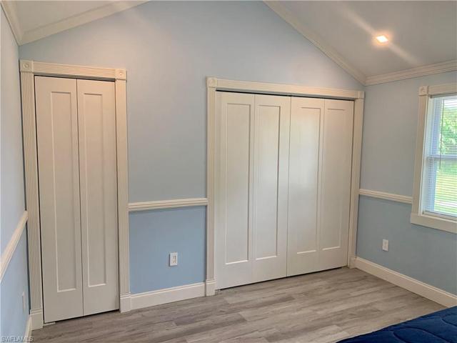 Guest bedroom toward closets.