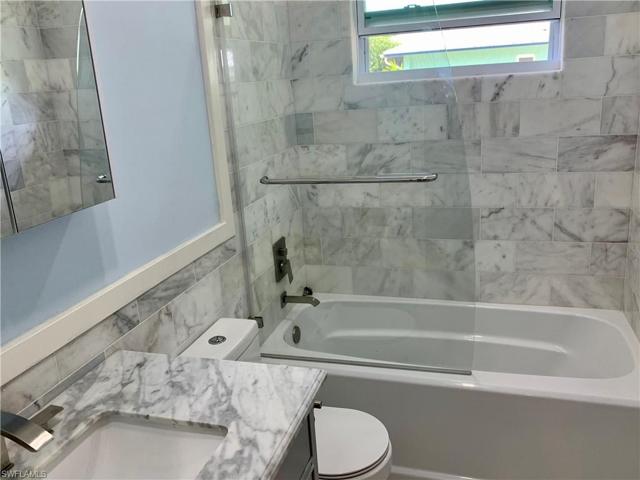Guest bath with tub and shower.