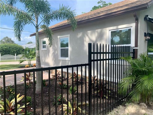 Closer view of side yard, fence and Matheson