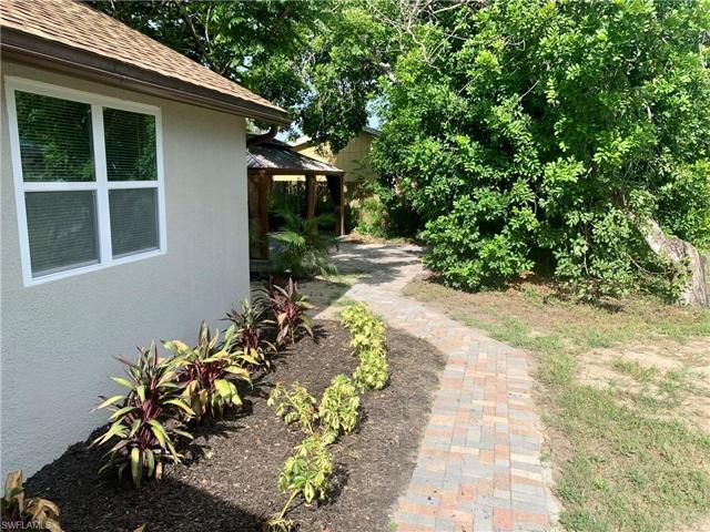Paver walk leading to gazebo.