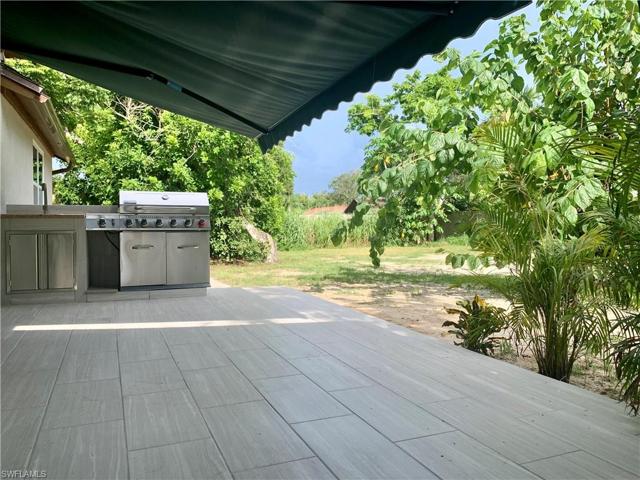 Large patio with grill/summer kitchen