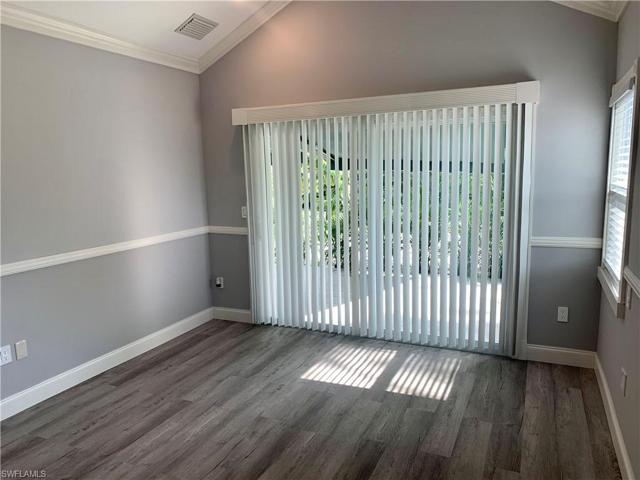 Main bedroom with sliders going out to patio.
