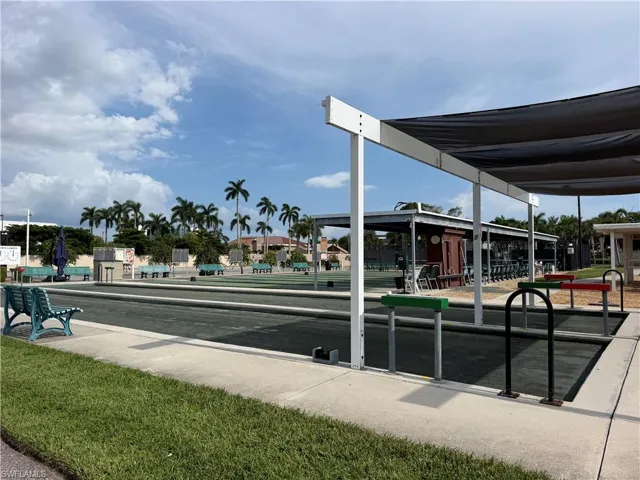 Bocce ball courts featuring shade structures and perimeter seating
