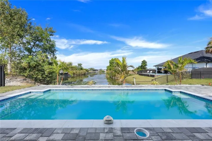 View of pool featuring a water view