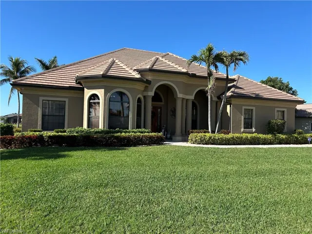 View of front of property with a front lawn