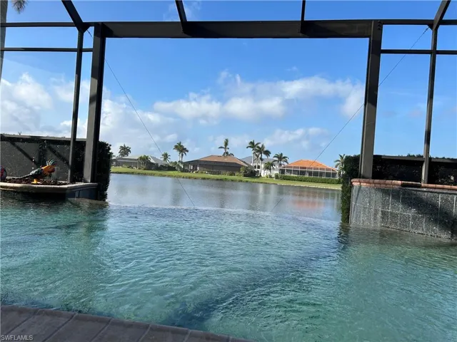 View from Lanai looking through the Picture window and infinity edge.