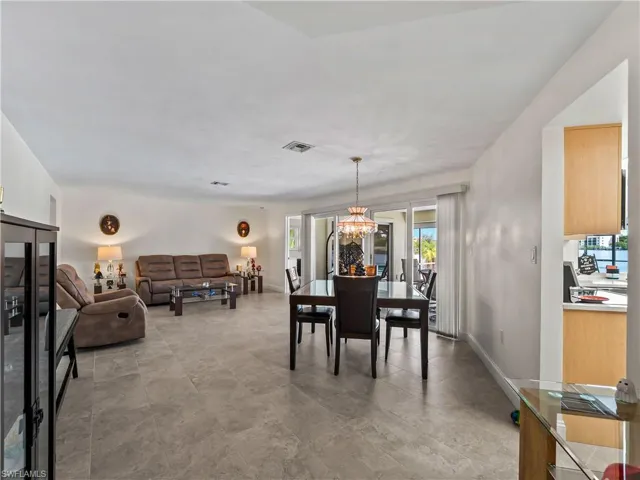 DiningLiving_2903rdSt_BonitaSprings_OpenConcept_Corner.jpg