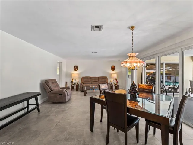 DiningLiving_2903rdSt_BonitaSprings_OpenConcept_SliderView.jpg