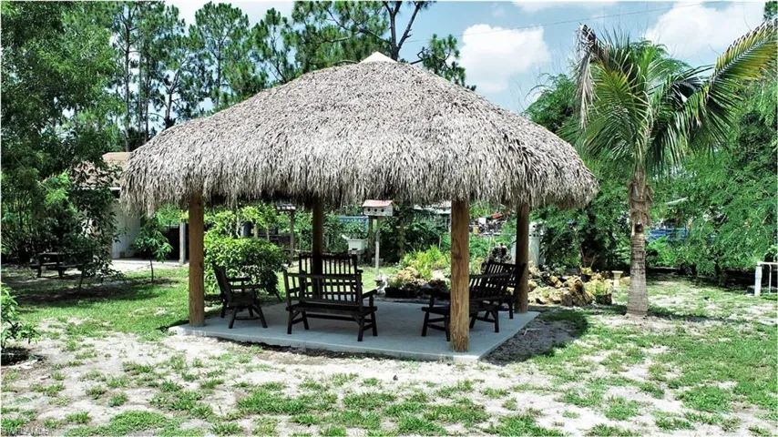 View of home's community featuring a patio area and a gazebo