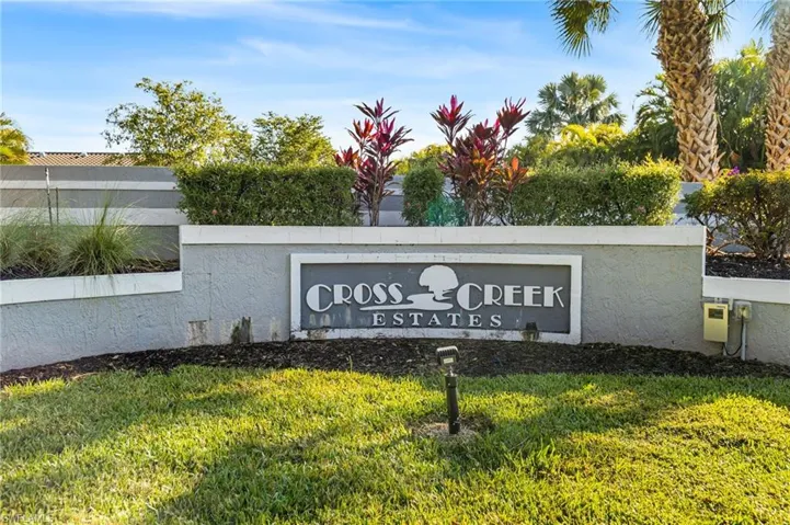 Community sign featuring a yard
